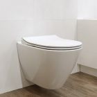 Súprava WC misa s pomaly sa sklápajúcim sedadlom Cersanit City K701-104, podomietkový konšrukcia so splachovacím tlačidlom Cersanit S701-778